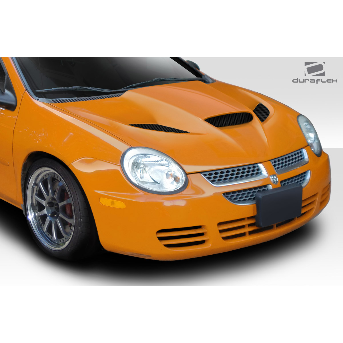 Modify your Dodge Neon 2000 with our Exterior/Hoods - Angle shows right front quarter of the vehicle