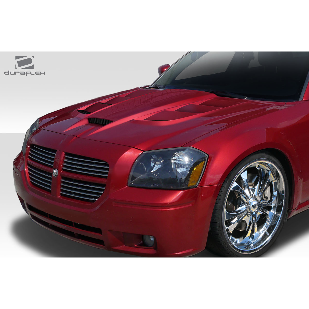 Modify your Dodge Magnum 2005 with our Exterior/Hoods - Front angle view of a car hood