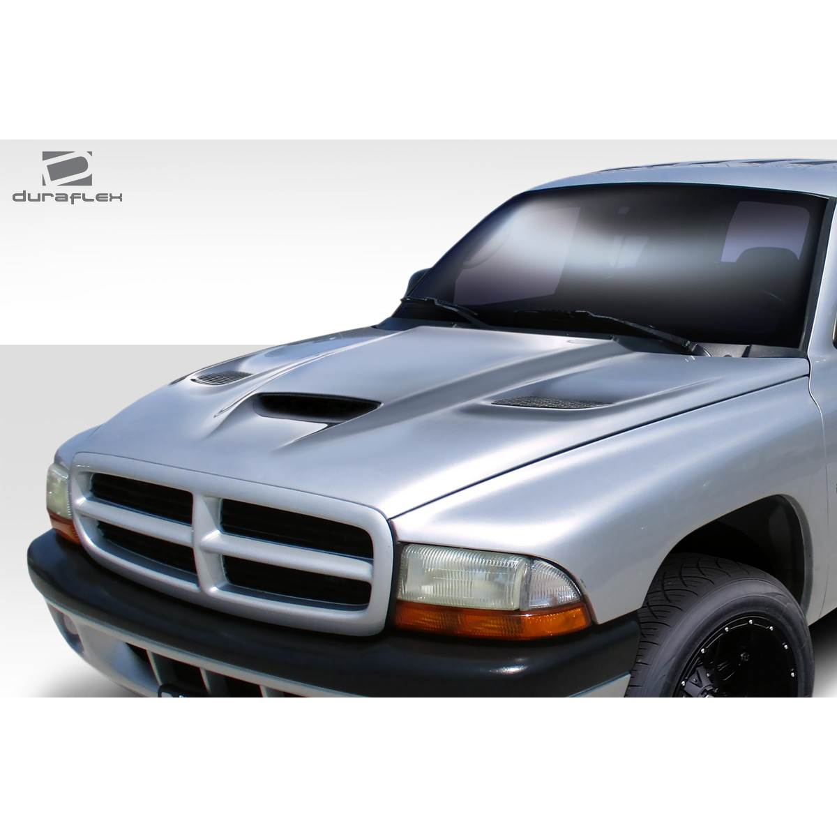 Modify your Dodge Dakota 1997 with our Exterior/Hoods - Front angle showing the hood design features