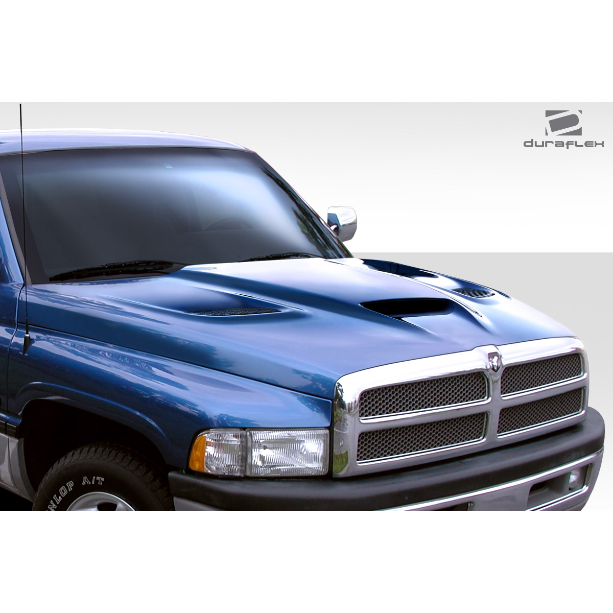 Modify your Dodge Ram 1994 with our Exterior/Hoods - Front angled view of a blue Dodge Ram hood