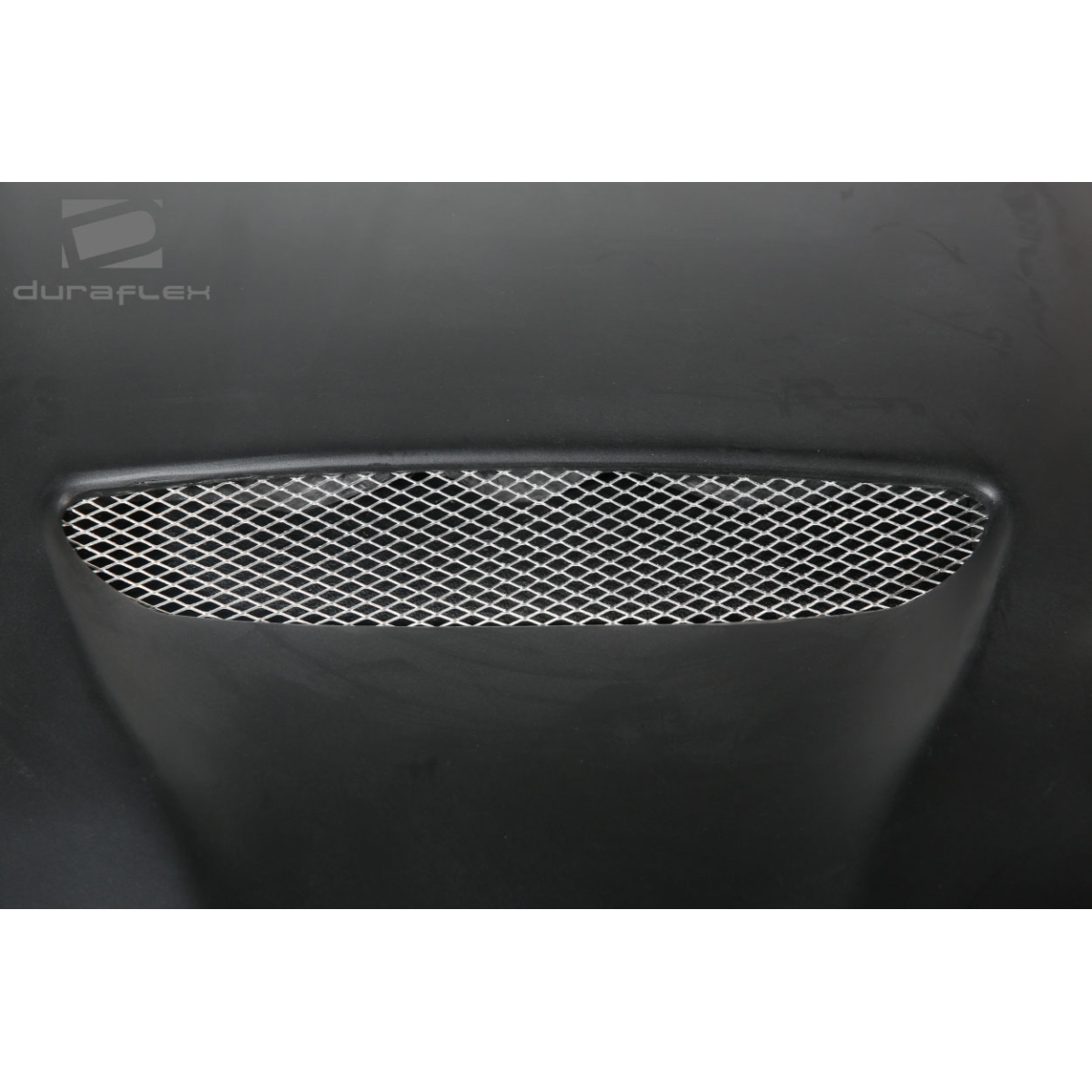 Modify your Dodge Ram 1994 with our Exterior/Hoods - Straight on view of the hood part with mesh vent