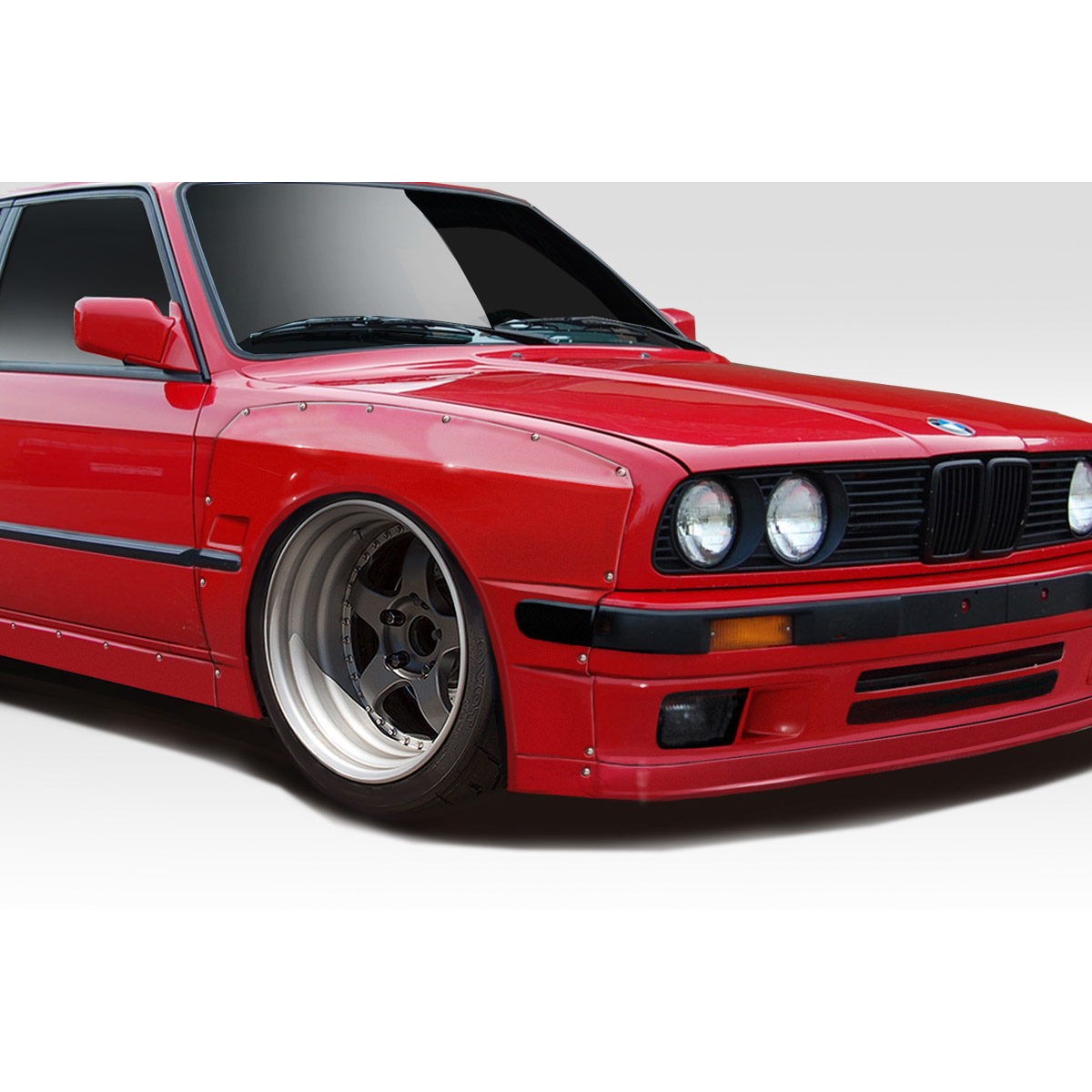 Modify your BMW 3-Series 1984 with our Exterior/Complete Body Kits - Front angle showing wide body fender flares