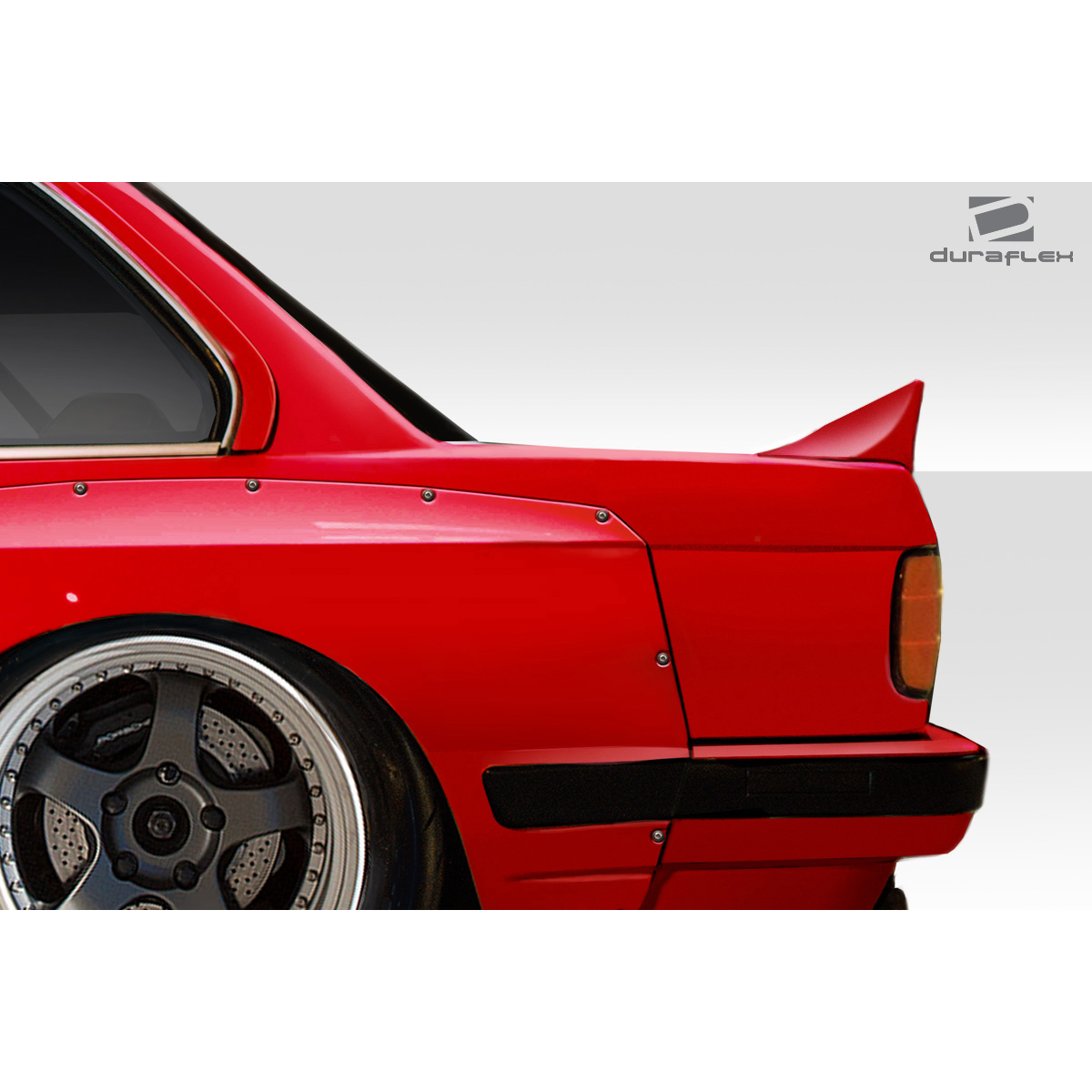 Modify your BMW 3-Series 1984 with our Exterior/Wings - Side view angle of the rear part of vehicle