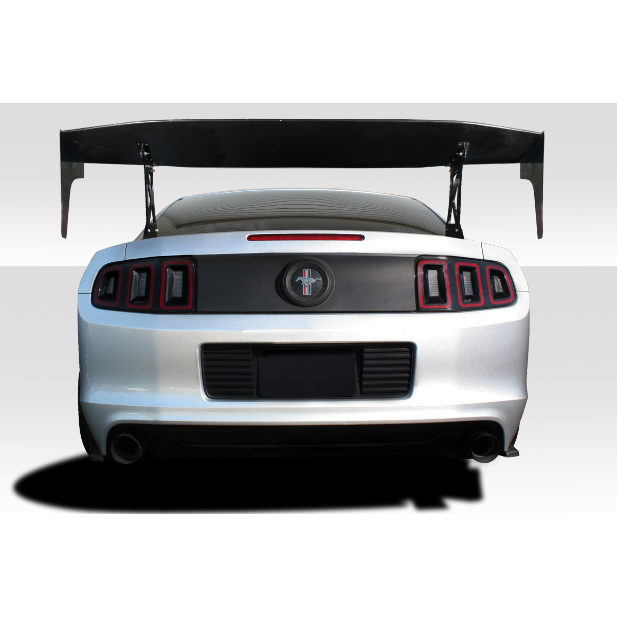 Modify your Universal   with our Exterior/Complete Body Kits - Rear view of a car with a high wing