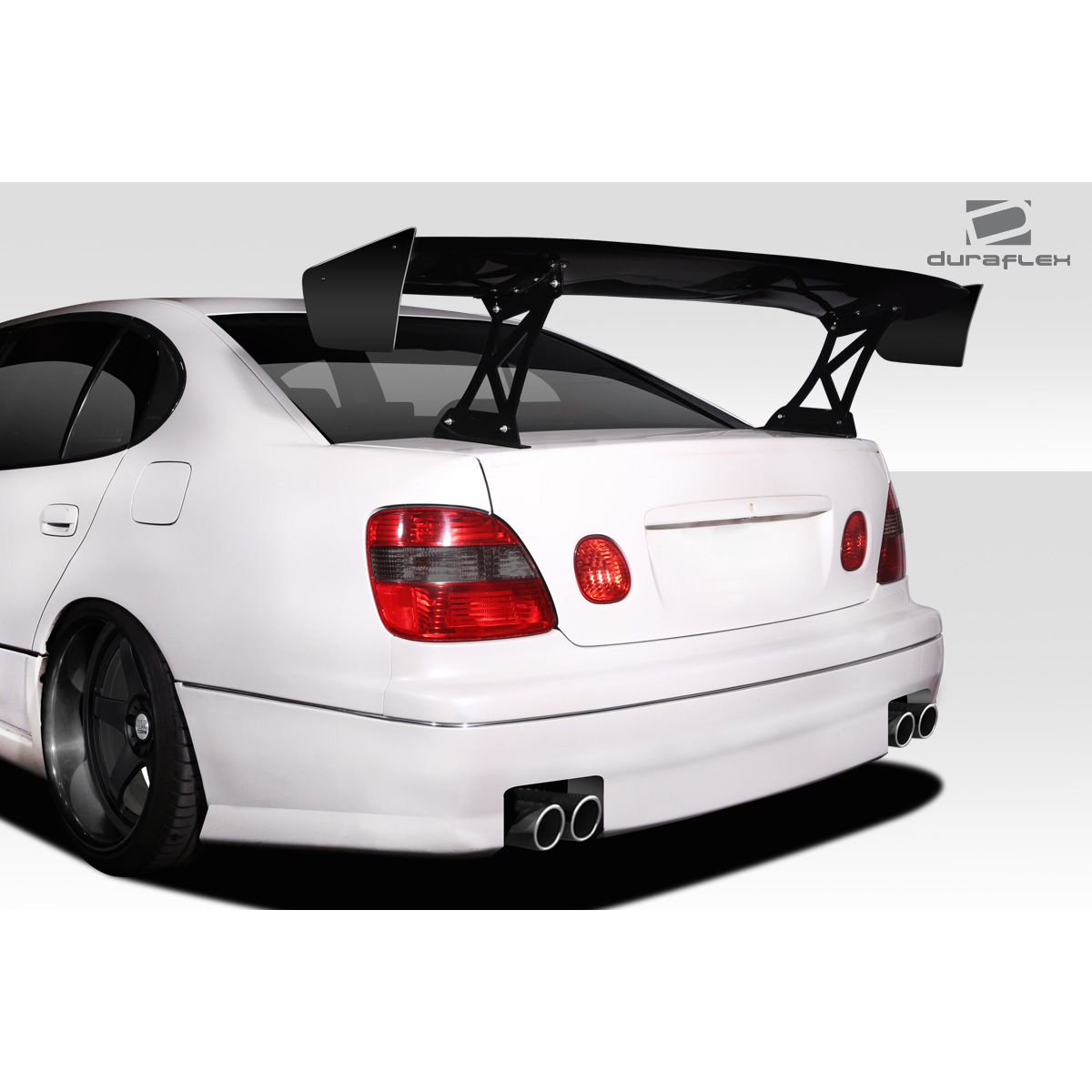 Modify your Universal   with our Exterior/Complete Body Kits - Rear view of vehicle showcasing wing and exhaust