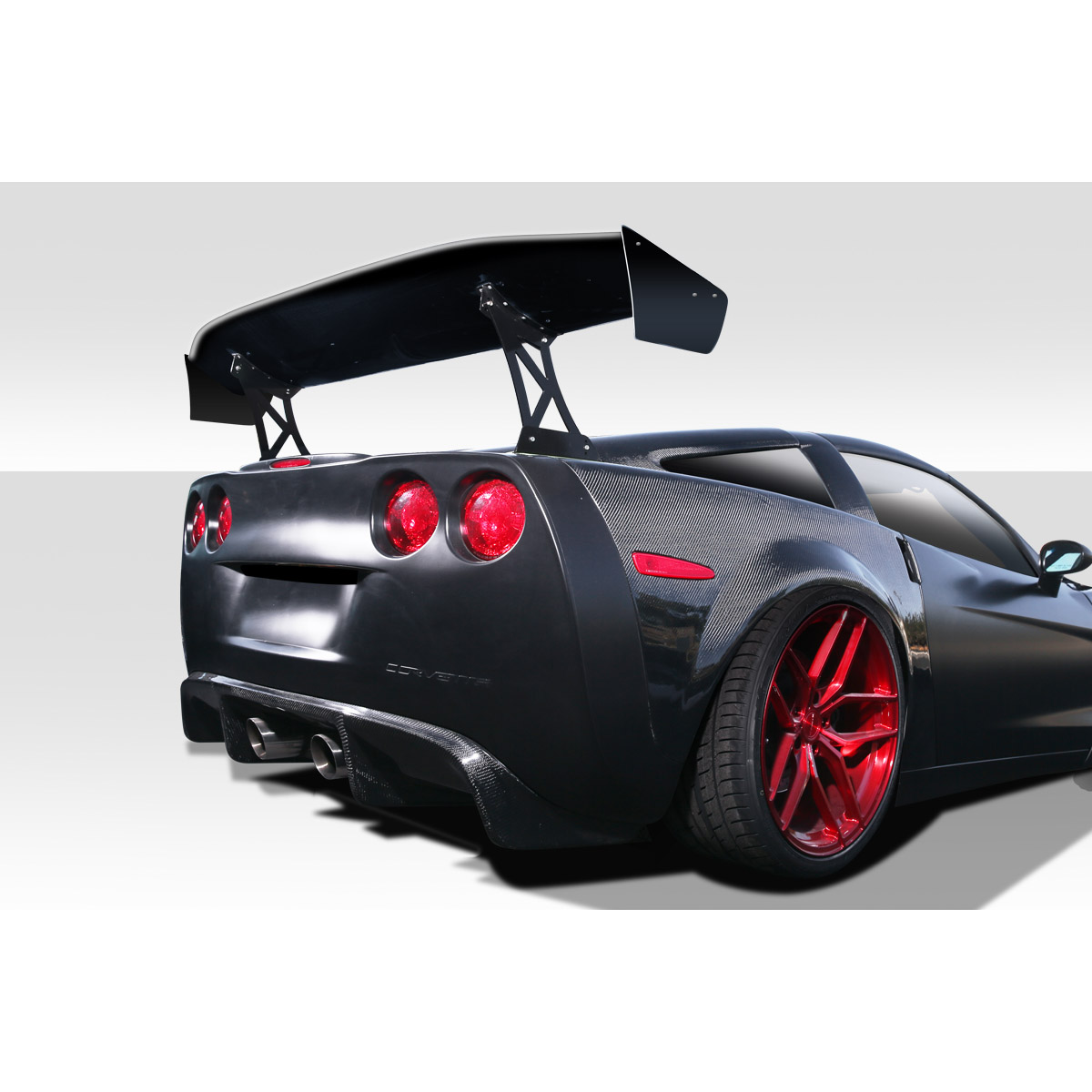 Modify your Universal   with our Exterior/Complete Body Kits - Rear angle view of a vehicle with a wing