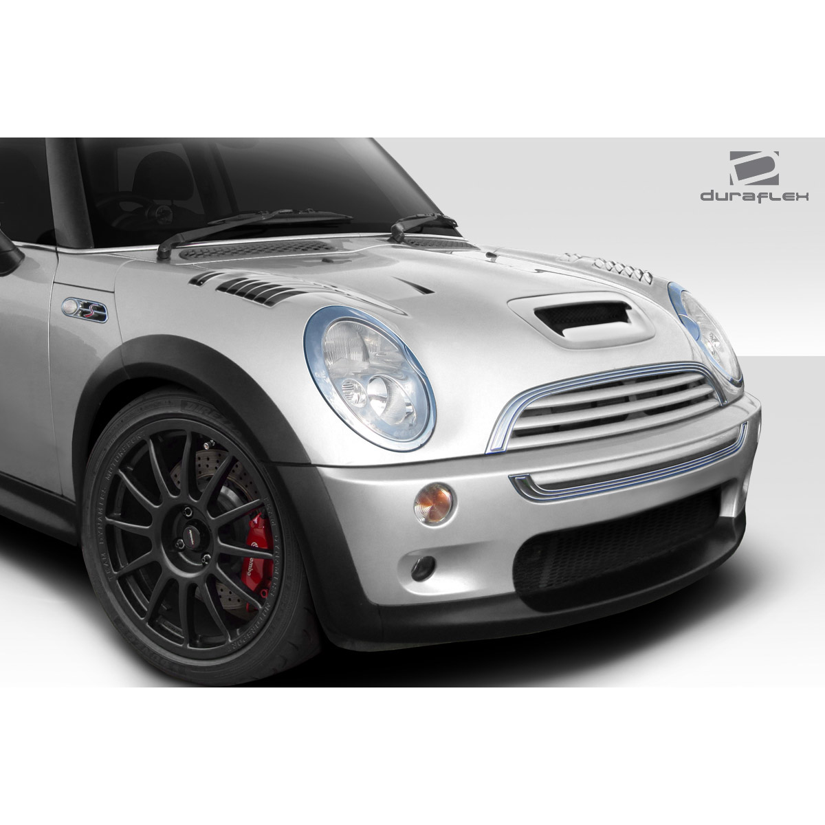 Modify your Mini Cooper 2002 with our Exterior/Hoods - Image shows car hood at a front angle