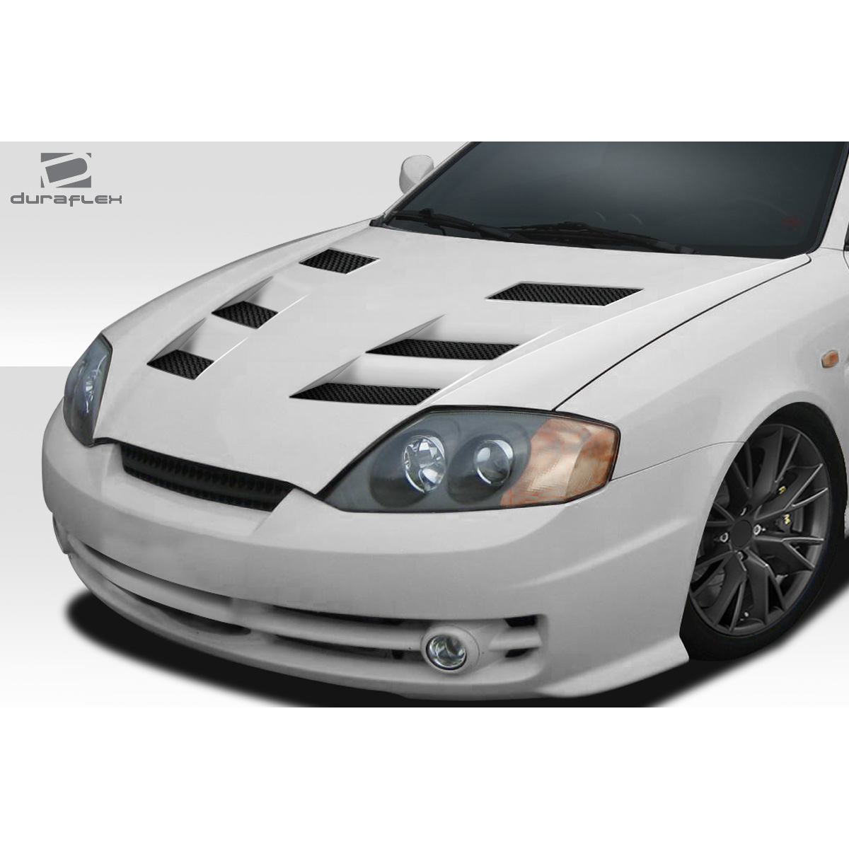 Modify your Hyundai Tiburon 2003 with our Exterior/Hoods - Image shows hood from a frontal high angle