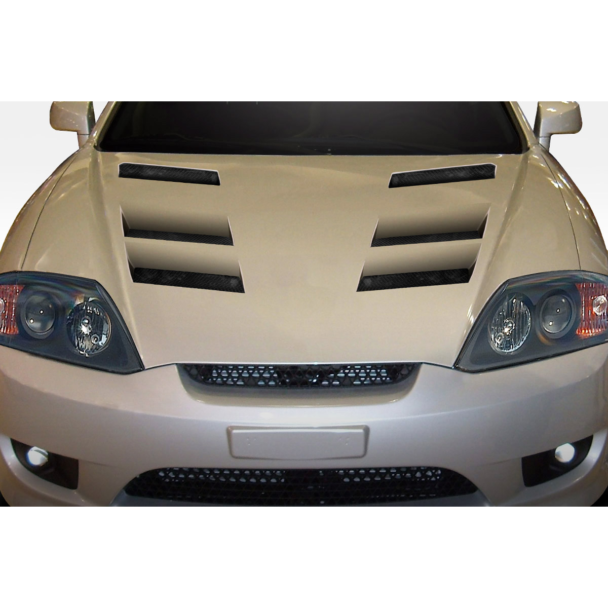 Modify your Hyundai Tiburon 2003 with our Exterior/Hoods - Viewed from the front at a slight angle