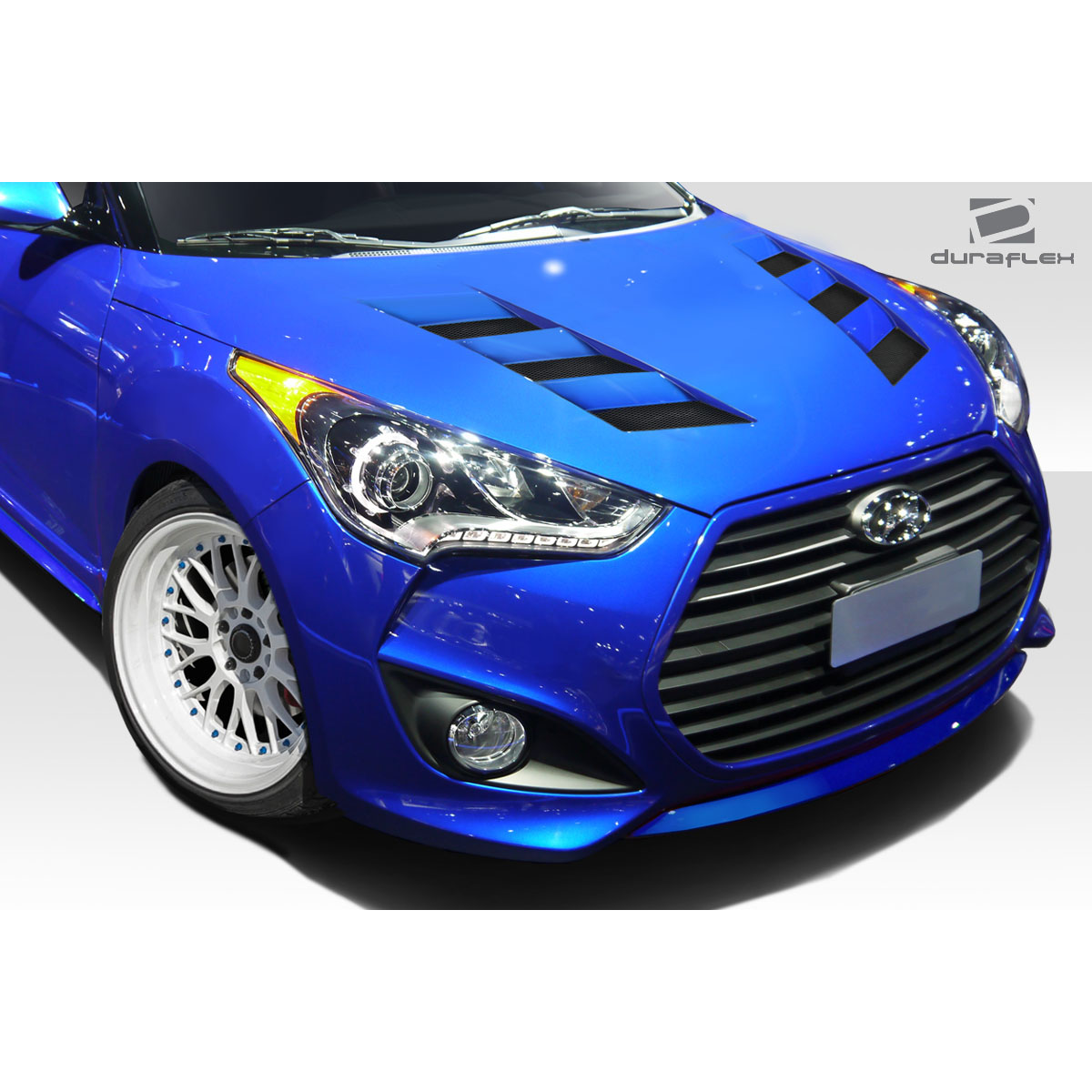 Modify your Hyundai Veloster 2012 with our Exterior/Hoods - Front three quarter angle view of hood