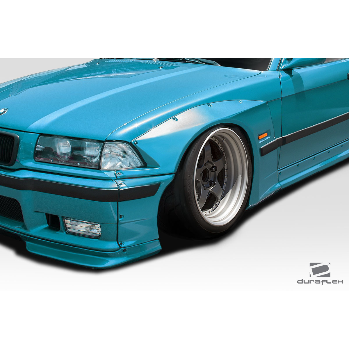 Modify your BMW 3-Series 1992 with our Exterior/Side Skirts - Angled view showing side skirts and wheel