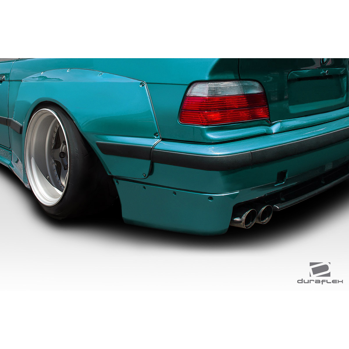 Modify your BMW 3-Series 1992 with our Exterior/Complete Body Kits - Rear angled view showcasing the bumper and exhaust