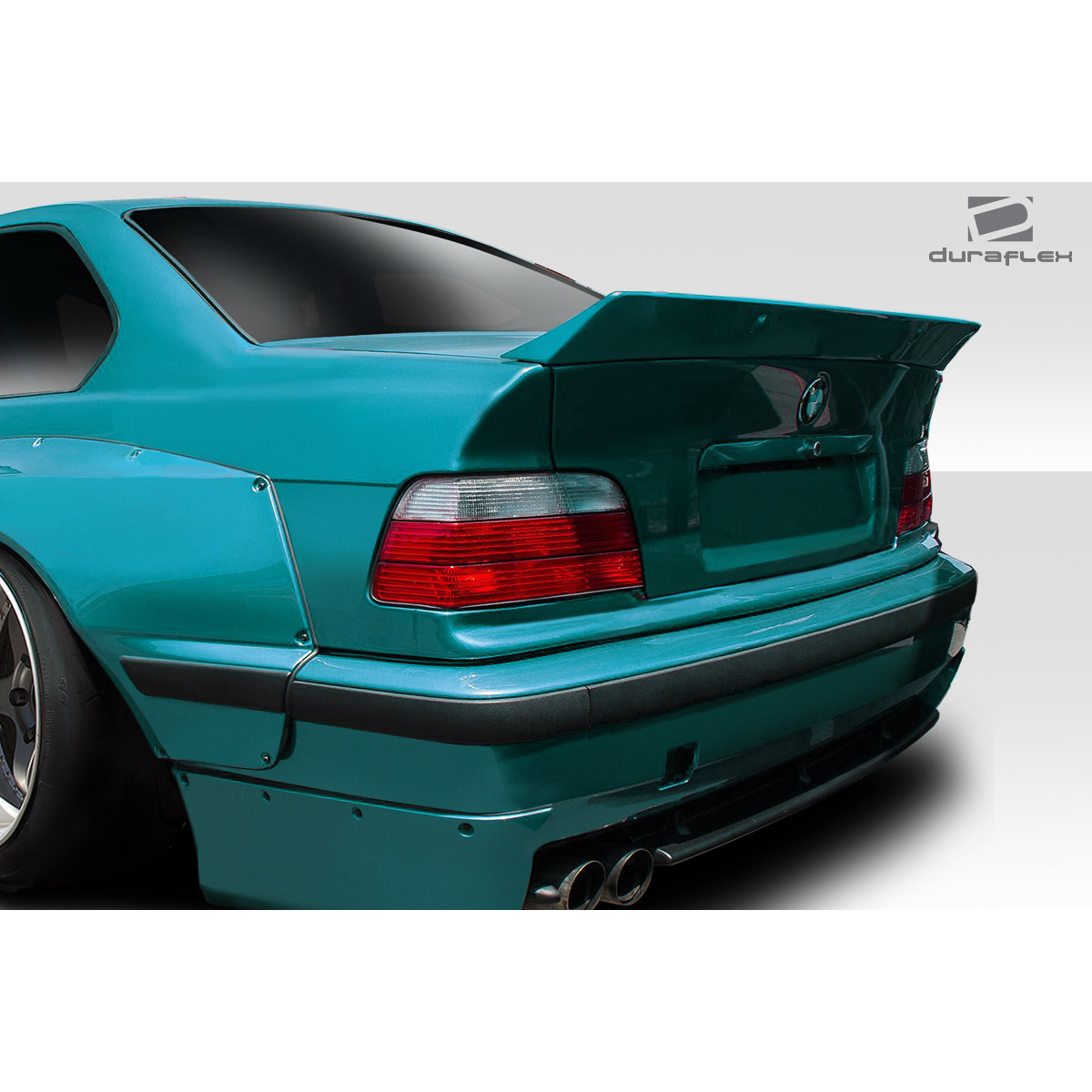 Modify your BMW 3-Series 1992 with our Exterior/Complete Body Kits - Angled view from the rear of the vehicle