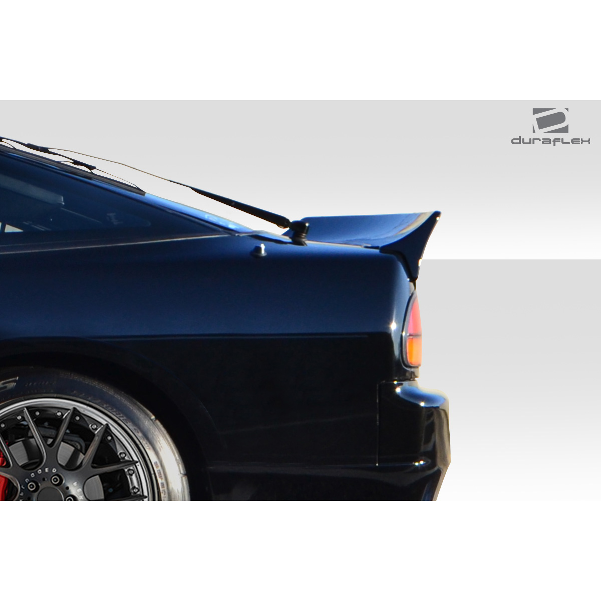 Modify your Nissan 240SX 1989 with our Exterior/Complete Body Kits - Side angle of car showing rear wing features