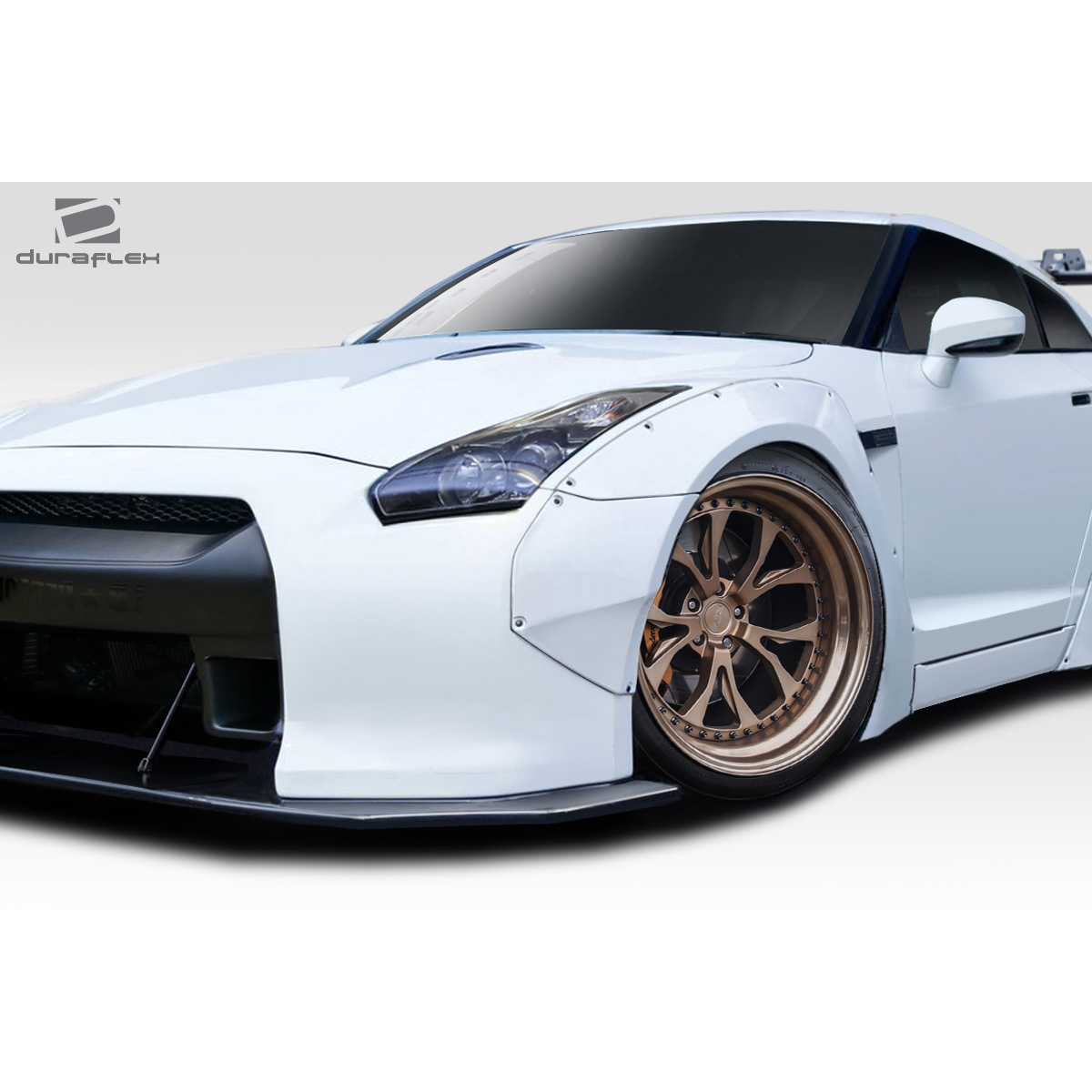 Modify your Nissan GT-R 2009 with our Exterior/Complete Body Kits - Front angle view of the car with fender flares