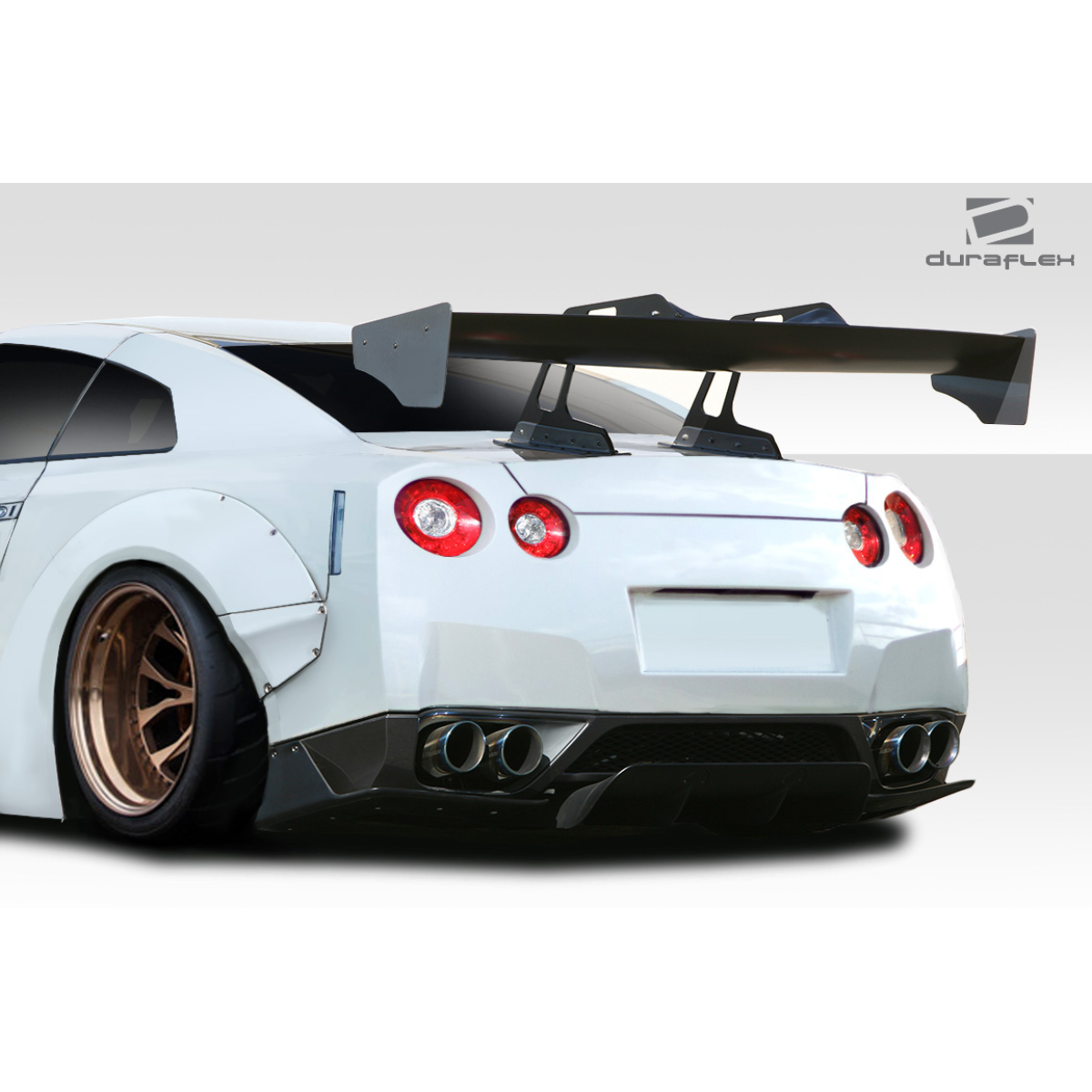 Modify your Nissan GT-R 2009 with our Exterior/Complete Body Kits - Rear angle showcasing diffuser and wing design