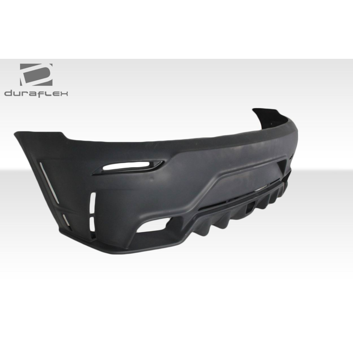 Modify your BMW Z4 2009 with our Exterior/Rear Bumpers or Lips - Angle shows rear bumper from a side perspective