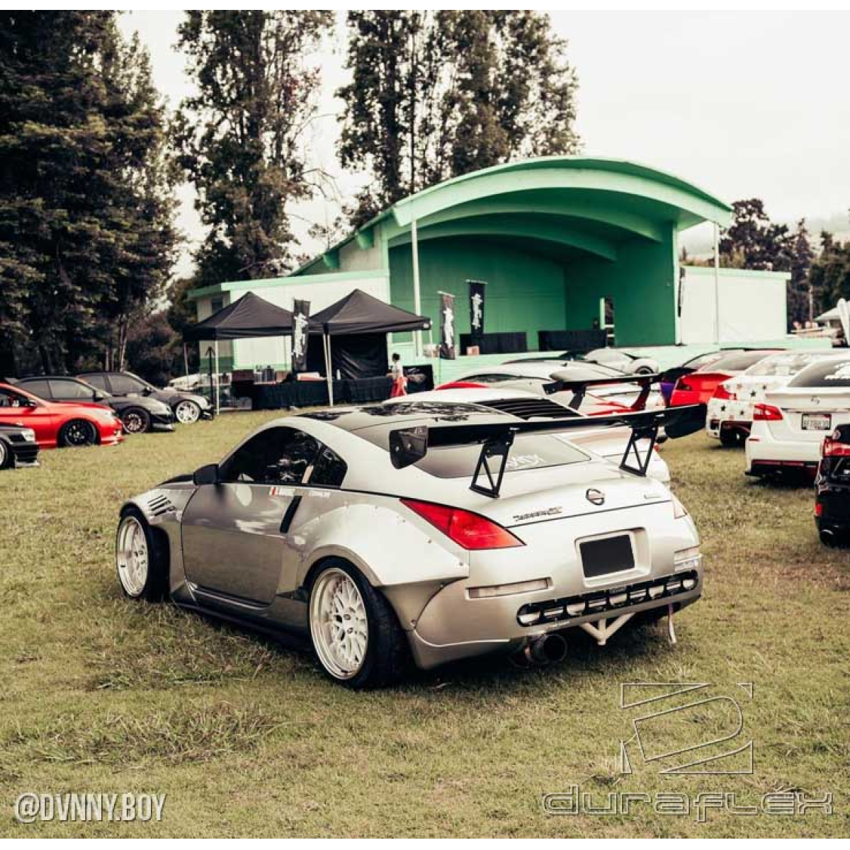 Modify your Nissan 350Z 2003 with our Exterior/Fenders - Rear angle showcasing the vehicle's flared fenders