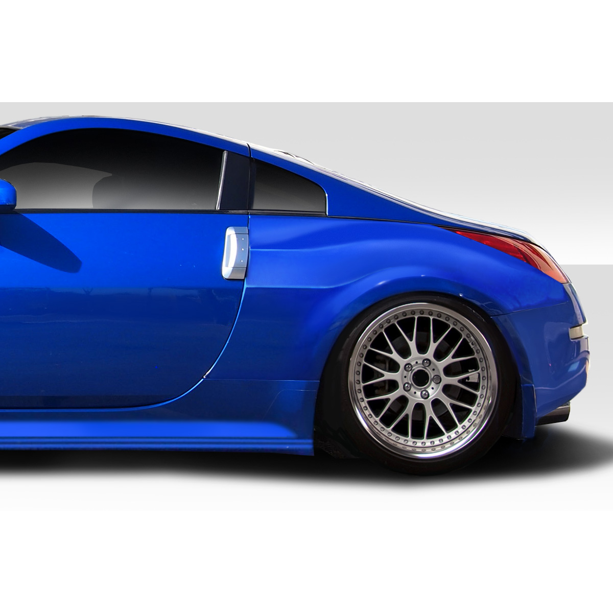 Modify your Nissan 350Z 2003 with our Exterior/Fenders - Side angle view of a blue Nissan 350Z