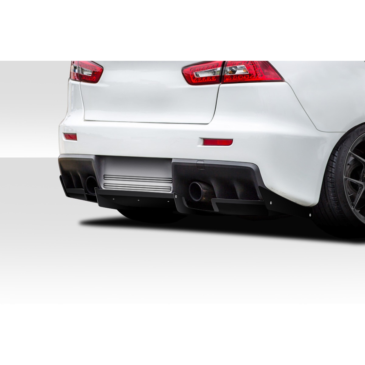 Modify your Mitsubishi Evolution 2008 with our Exterior/Diffusers - Rear angle view of a Mitsubishi Evolution diffuser