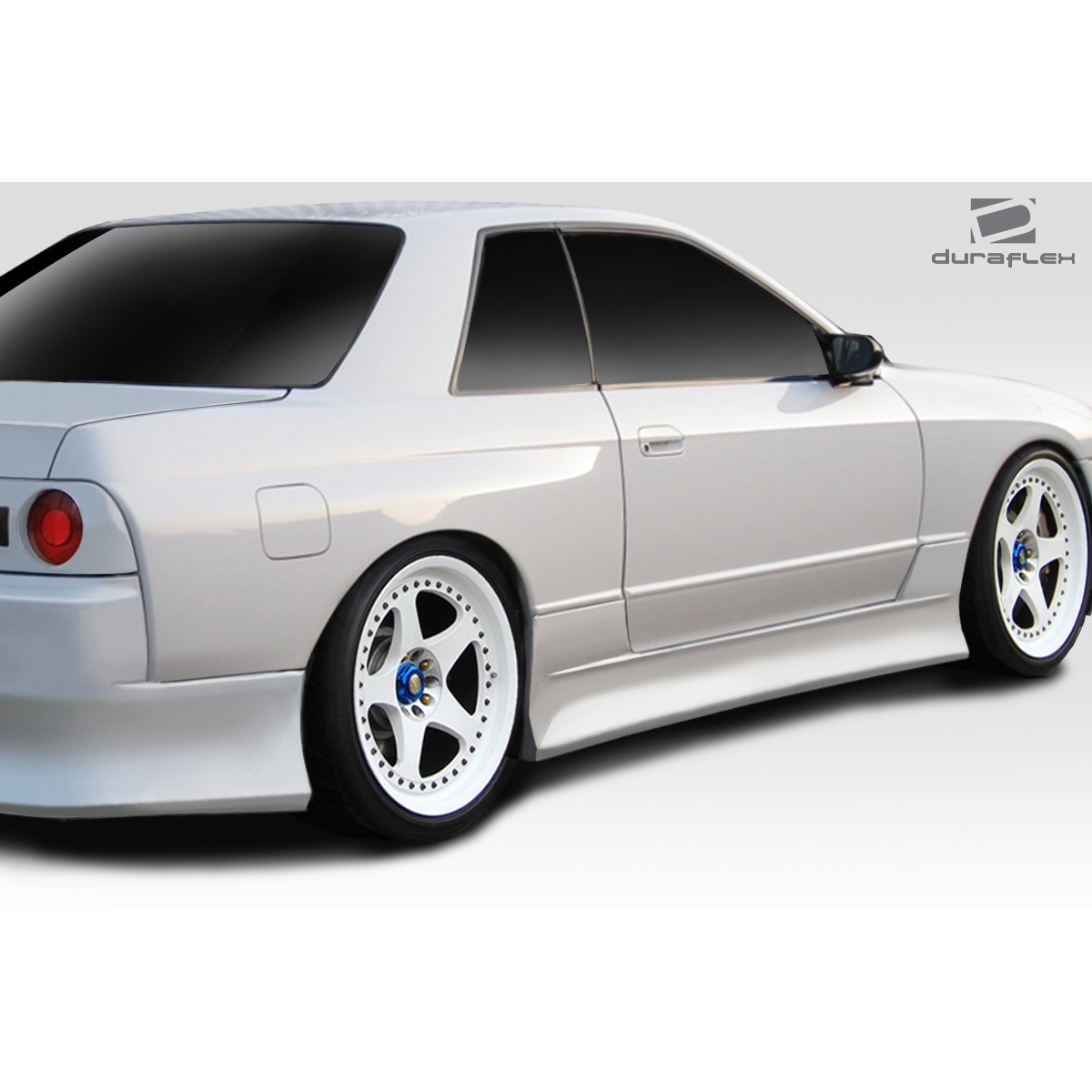 Modify your Nissan Skyline 1989 with our Exterior/Complete Body Kits - Side view angle showcasing vehicle's design features