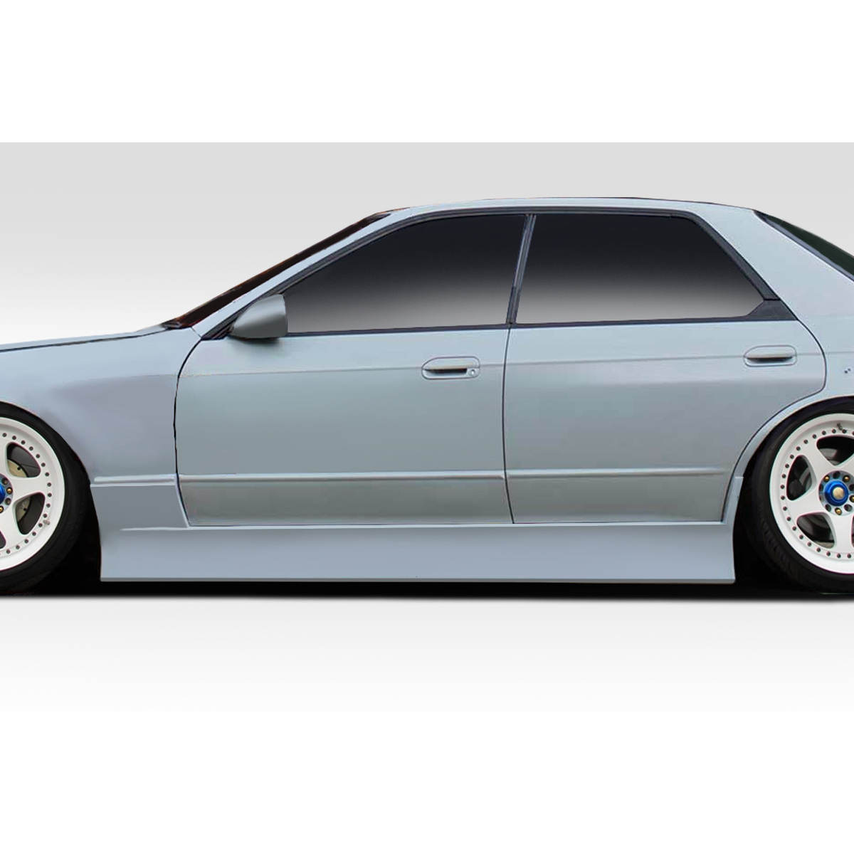 Modify your Nissan Skyline 1989 with our Exterior/Complete Body Kits - Side view of a Nissan Skyline R32