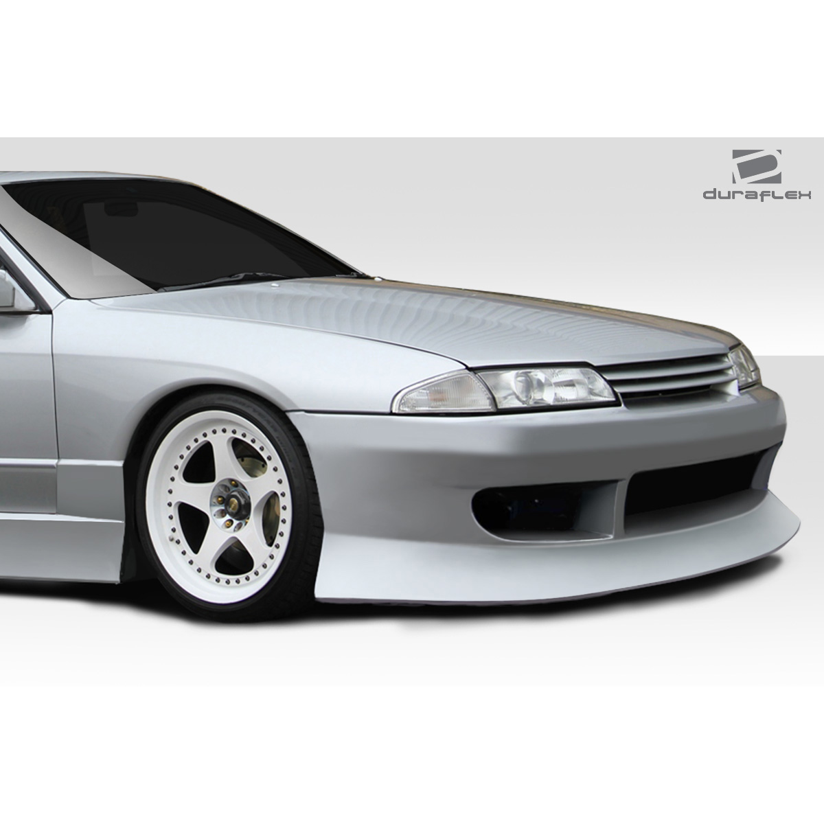 Modify your Nissan Skyline 1989 with our Exterior/Front Bumpers or Lips - Front angle view of Nissan Skyline R32 bumper