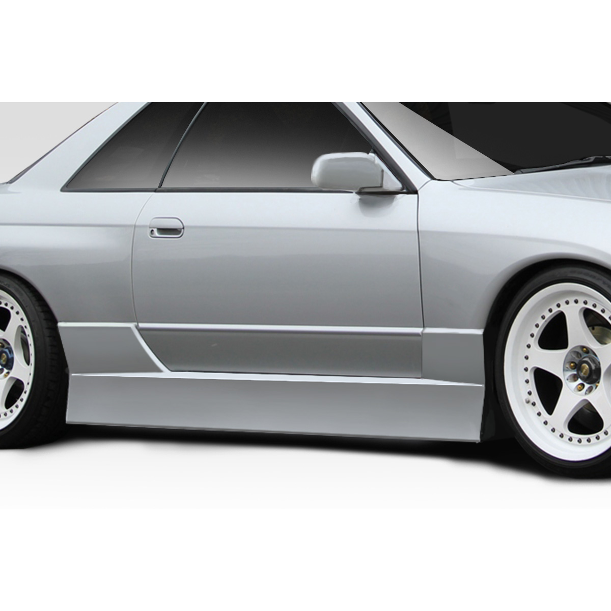 Modify your Nissan Skyline 1989 with our Exterior/Side Skirts - Side view of a car at a low angle