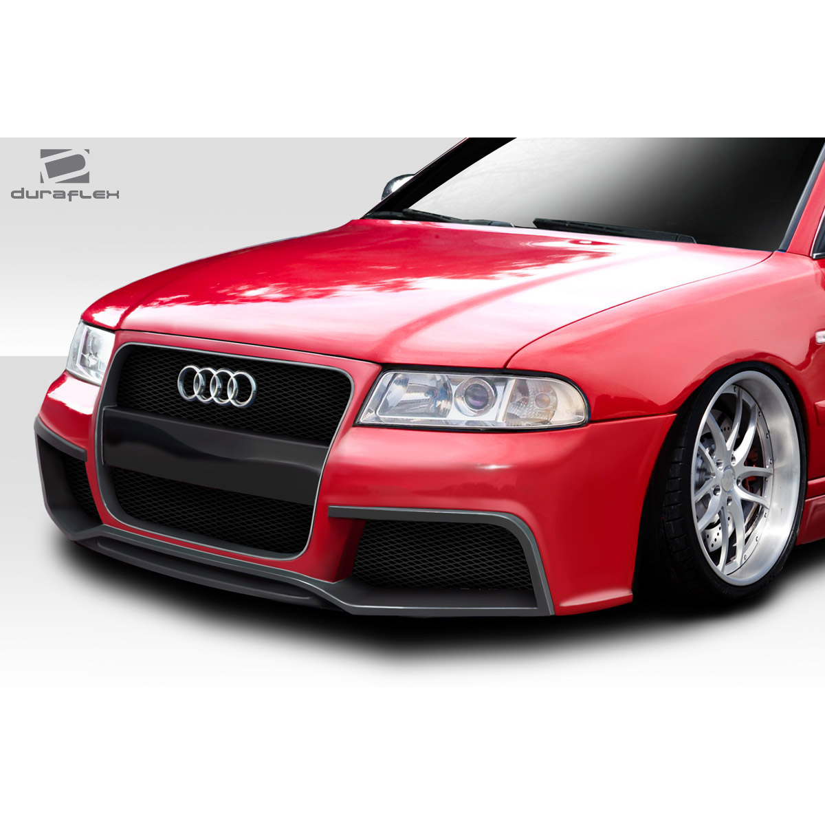 Modify your Audi A4 1996 with our Exterior/Front Bumpers or Lips - Front angle of the Audi A4 showcasing bumper design