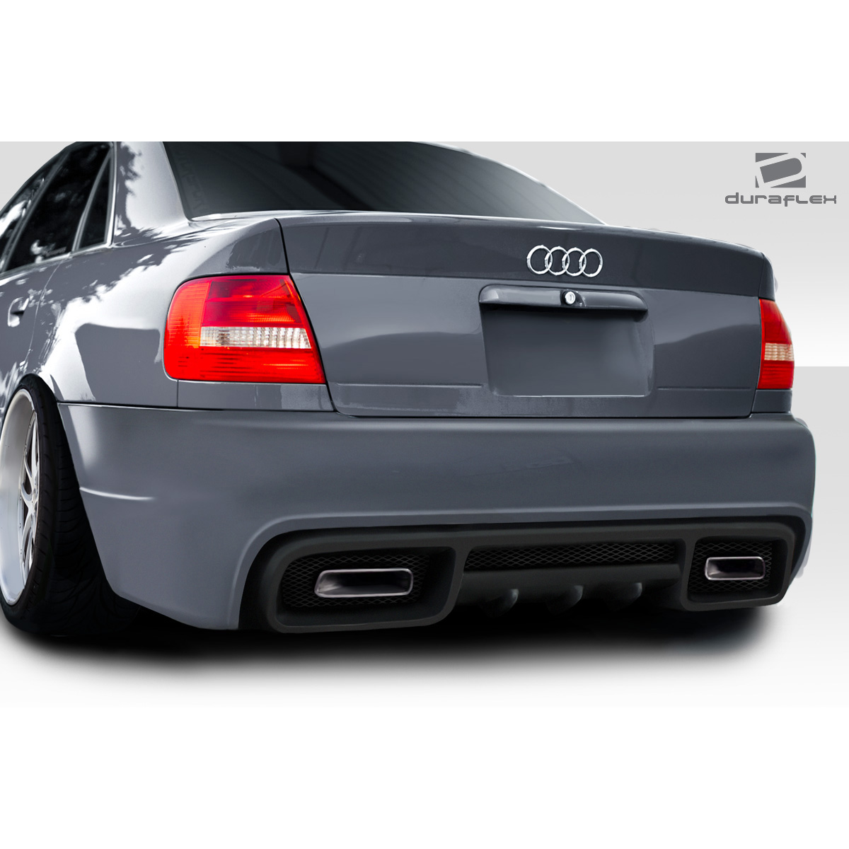 Modify your Audi A4 1996 with our Exterior/Complete Body Kits - Rear view angled perspective of the bumper