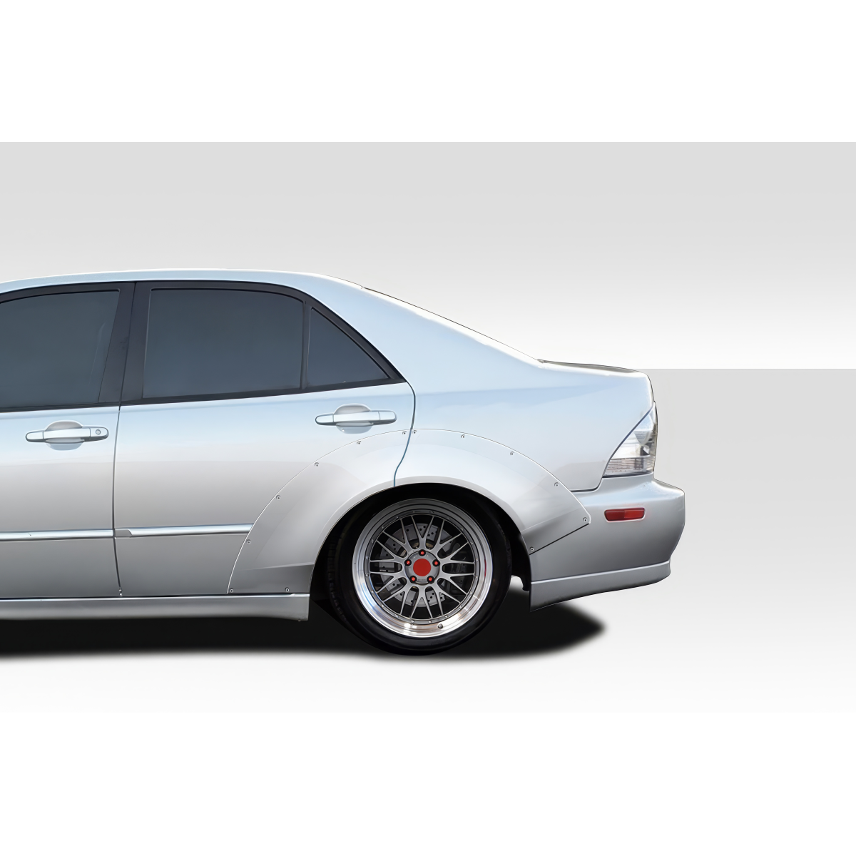 Modify your Lexus IS Series 2000 with our Exterior/Fenders - Rear angle of the vehicle focused on fender flares