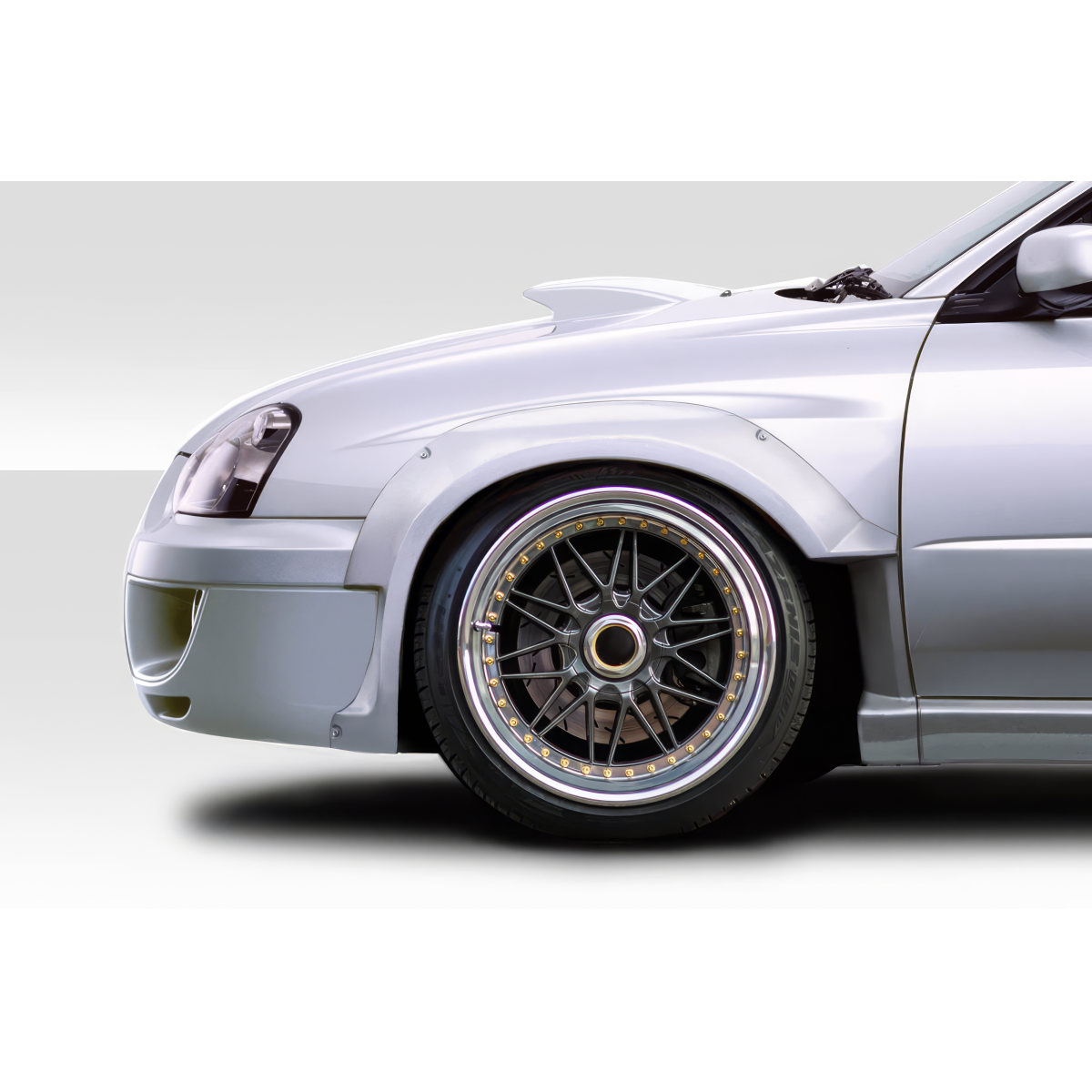 Modify your Subaru Impreza 2004 with our Exterior/Fenders - Side view of car at a slight angle