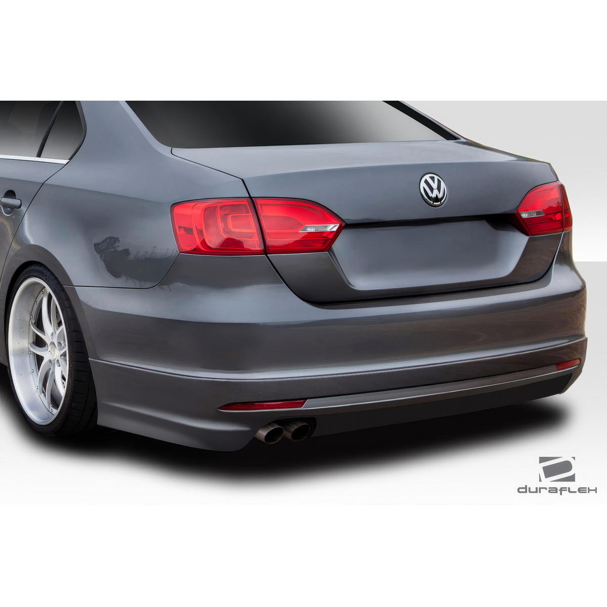 Modify your Volkswagen Jetta 2011 with our Exterior/Rear Bumpers or Lips - The part is viewed from a slight rear angle