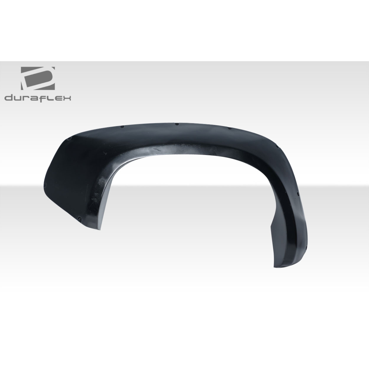 Modify your Toyota Tundra 2014 with our Exterior/Fenders - Angled view of a rear fender flare for Tundra