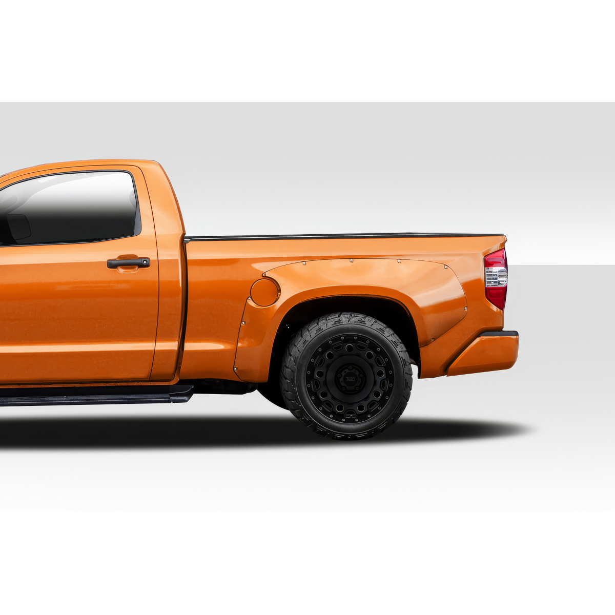 Modify your Toyota Tundra 2014 with our Exterior/Fenders - Side angle of the truck with fender flares