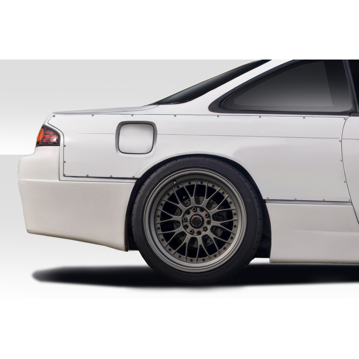 Modify your Nissan 240SX 1995 with our Exterior/Fenders - Side angle of car focusing on rear fender