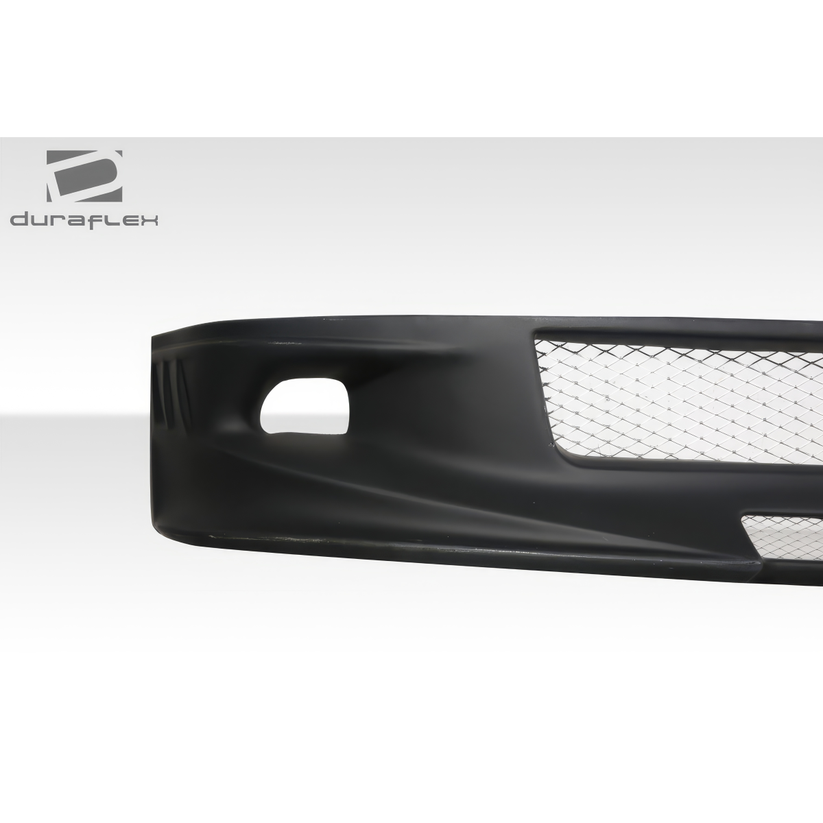 Modify your Scion tC 2005 with our Exterior/Front Bumpers or Lips - Part viewed at a slight angle from the side