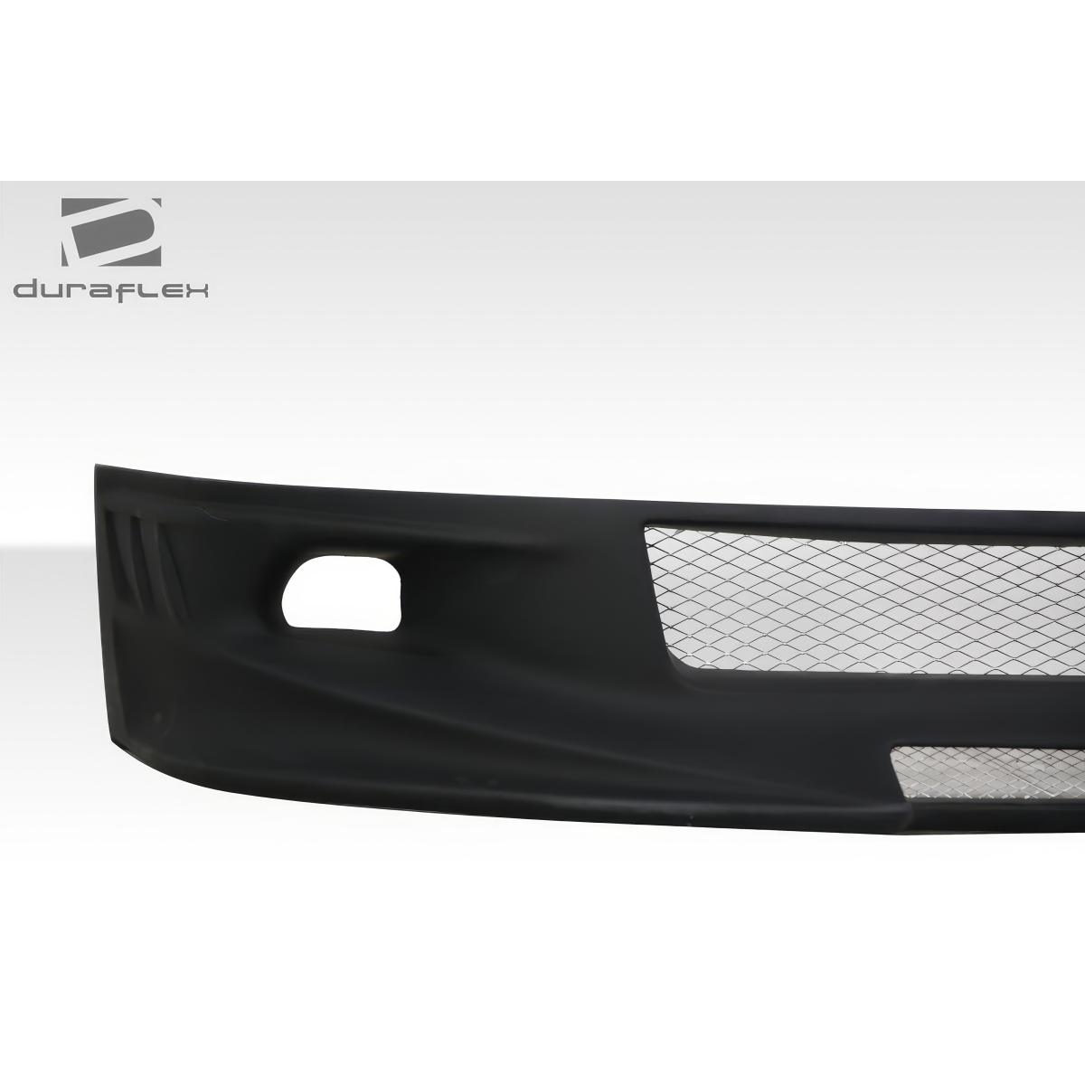 Modify your Scion tC 2005 with our Exterior/Front Bumpers or Lips - The part is shown at a slight side angle