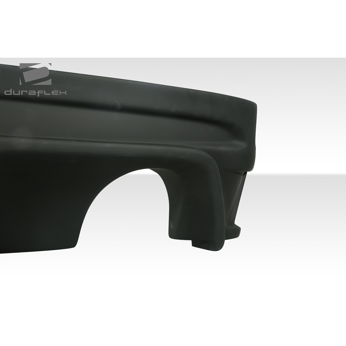 Modify your Scion tC 2005 with our Exterior/Rear Bumpers or Lips - Part shown at a side angle to highlight design