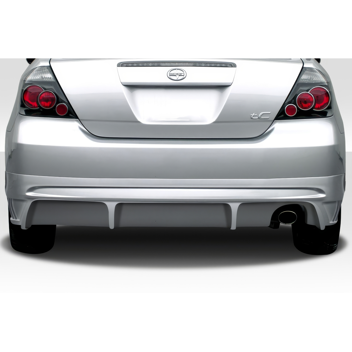 Modify your Scion tC 2005 with our Exterior/Rear Bumpers or Lips - Viewed from rear angle with focus on rear lip design