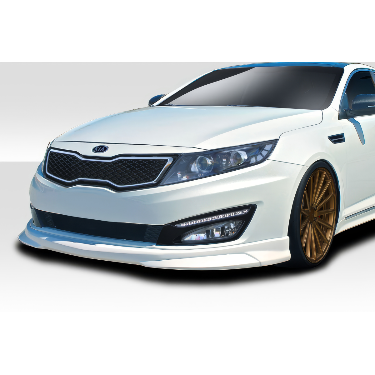 Modify your KIA Optima 2010 with our Exterior/Front Bumpers or Lips - Front angle of the vehicle with lip design