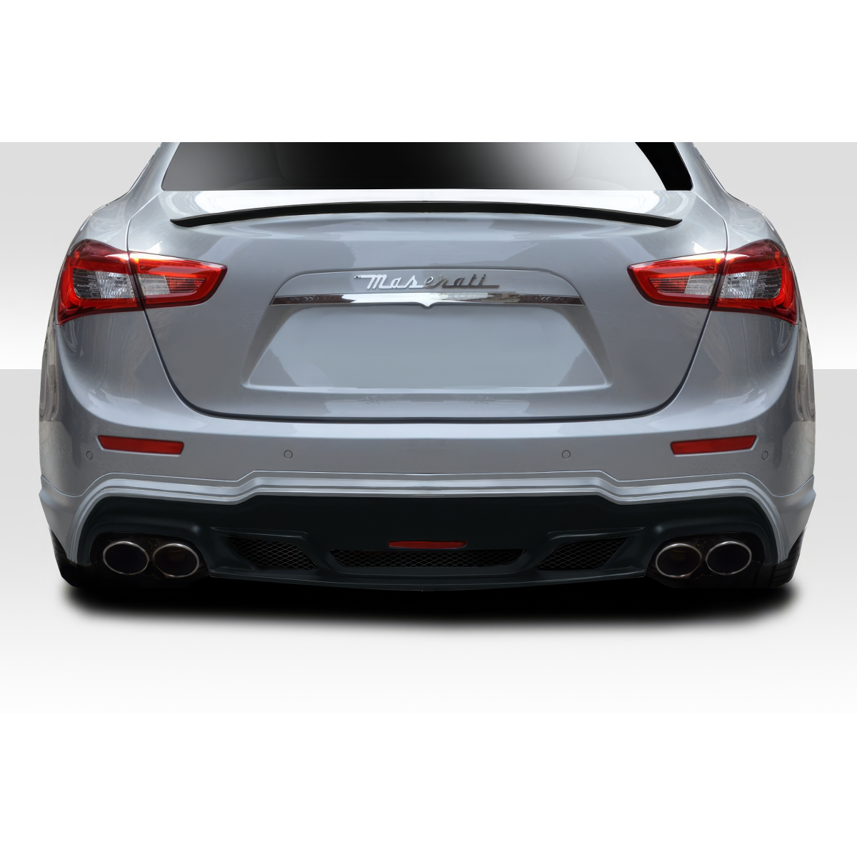 Modify your Maserati Ghibli 2014 with our Exterior/Rear Bumpers or Lips - Rear view at a straight angle