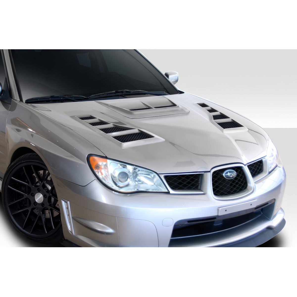 Modify your Subaru Impreza 2006 with our Exterior/Hoods - Front angle view of hood on Subaru Impreza