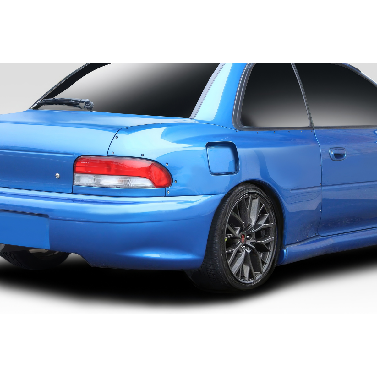 Modify your Subaru Impreza 1993 with our Exterior/Fenders - View from rear angle highlighting fender curves