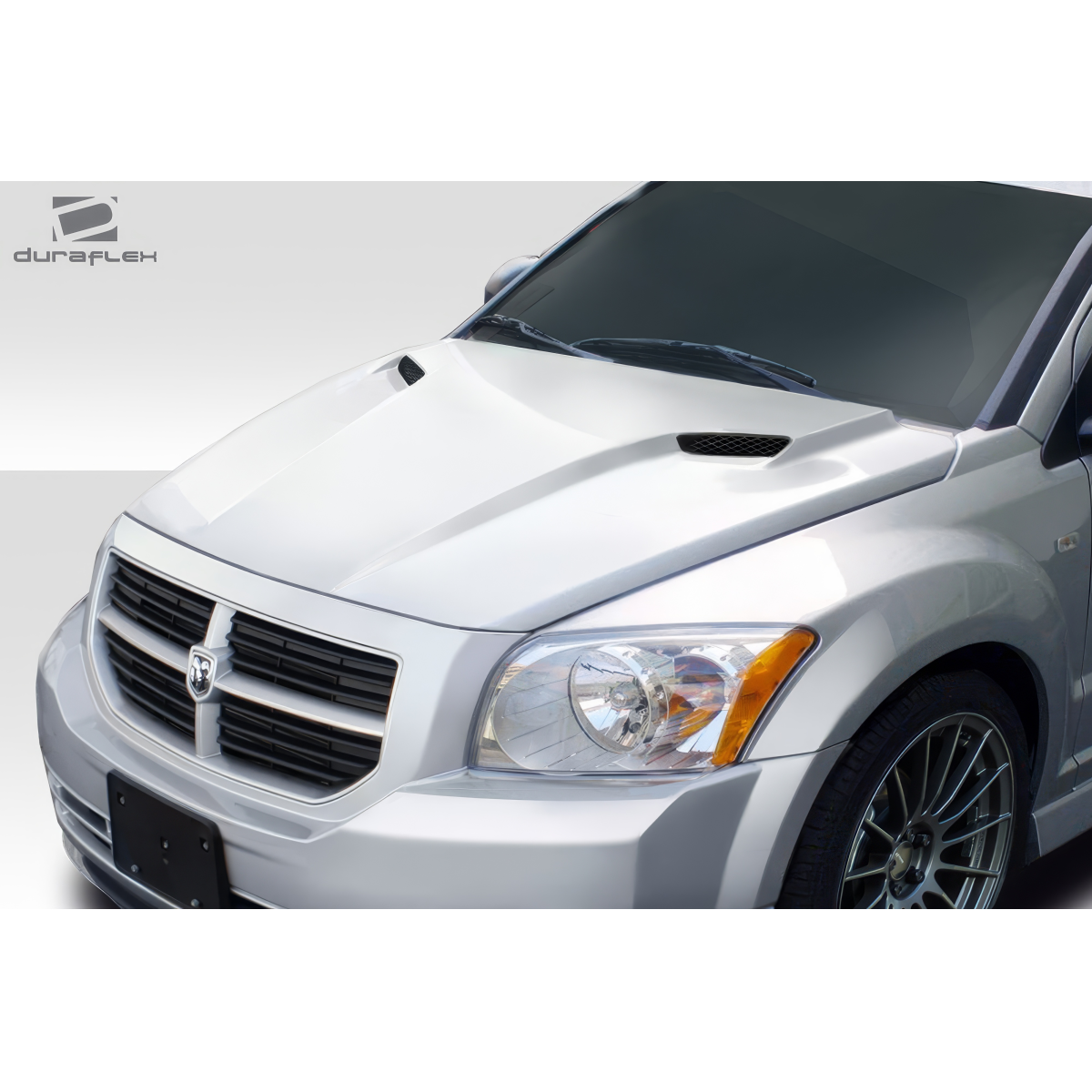Modify your Dodge Caliber 2007 with our Exterior/Hoods - Front angled view of the hood