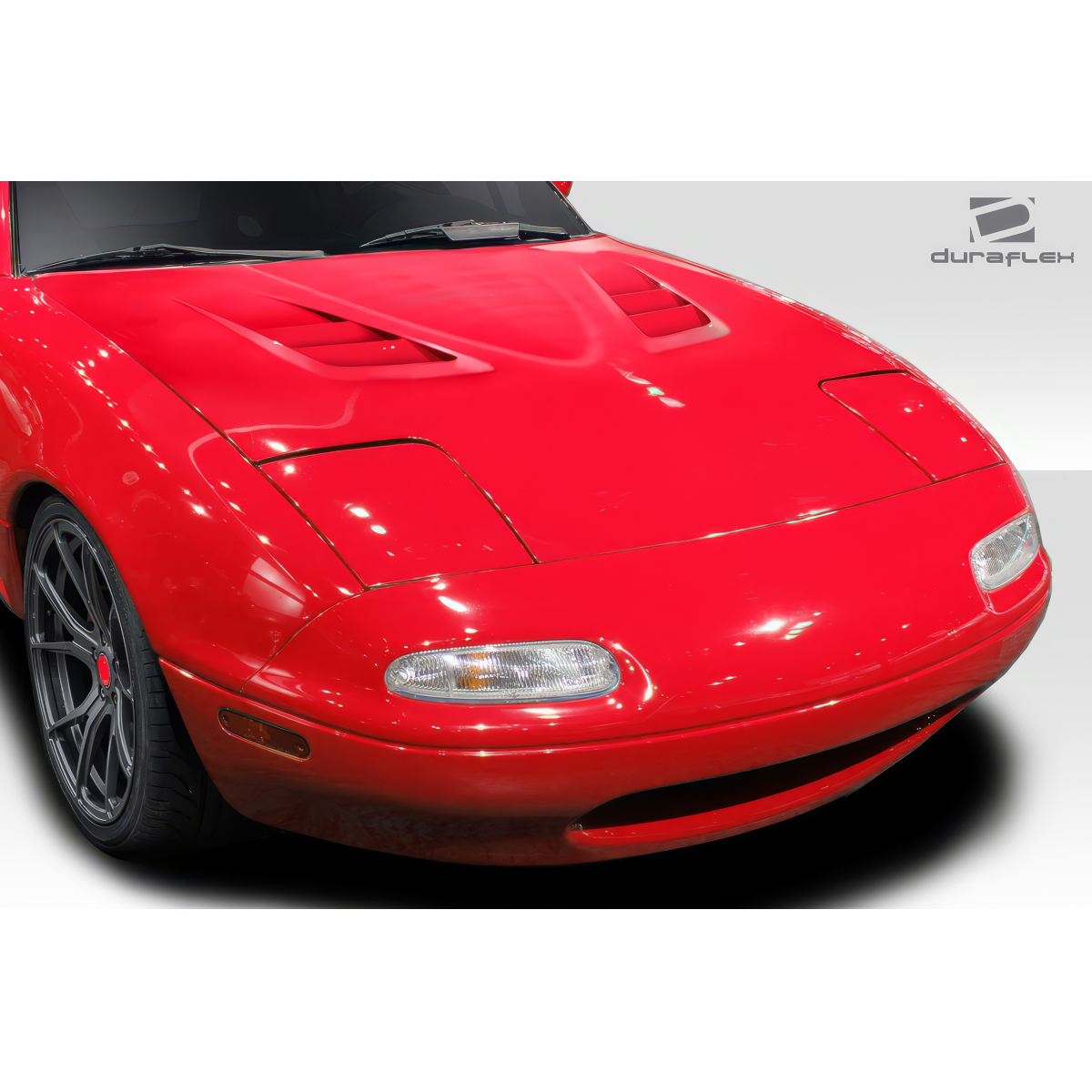 Modify your Mazda Miata 1990 with our Exterior/Hoods - Front angle view of Mazda Miata hood