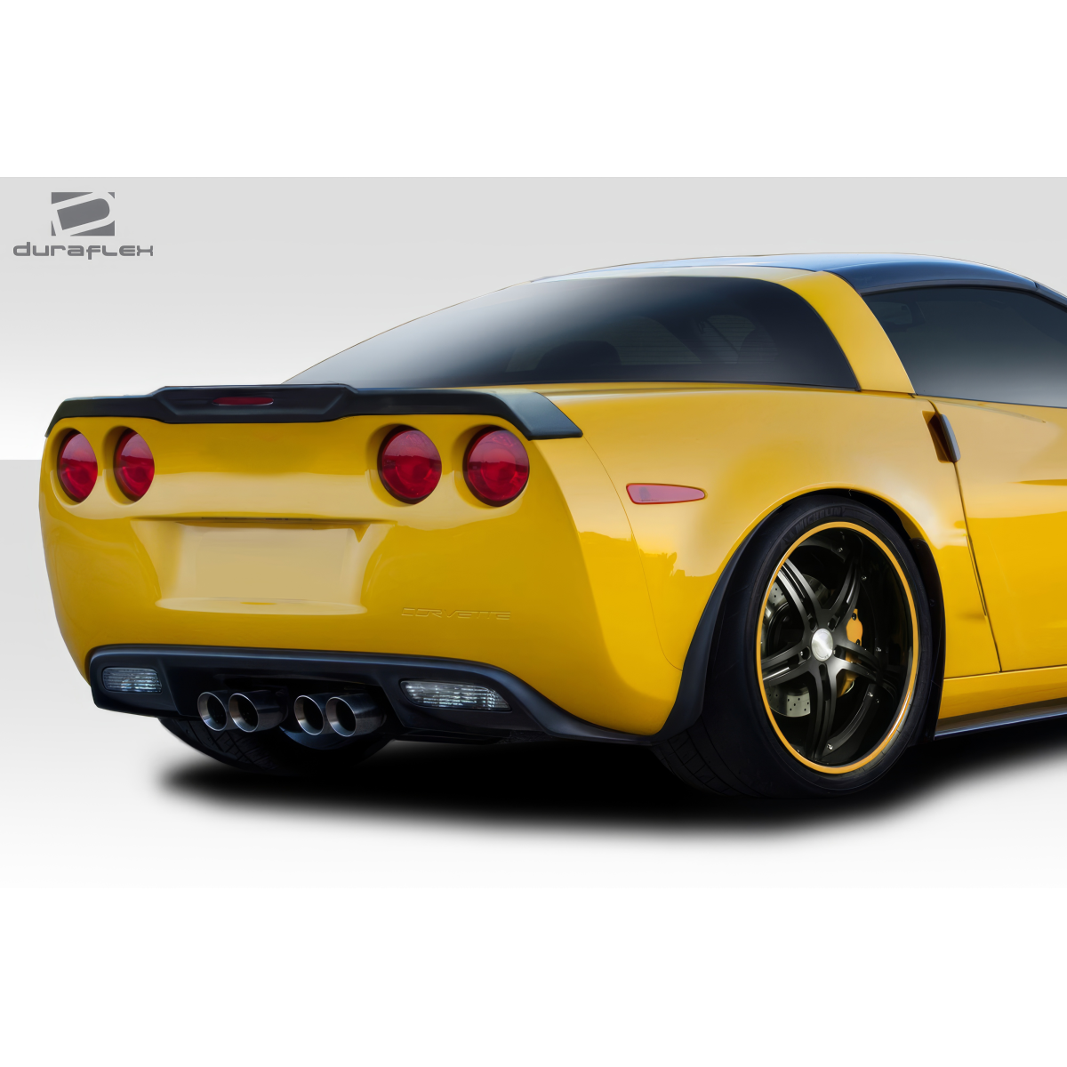 Modify your Chevrolet Corvette 2005 with our Exterior/Wings - Rear angle view of a yellow Chevrolet Corvette C6