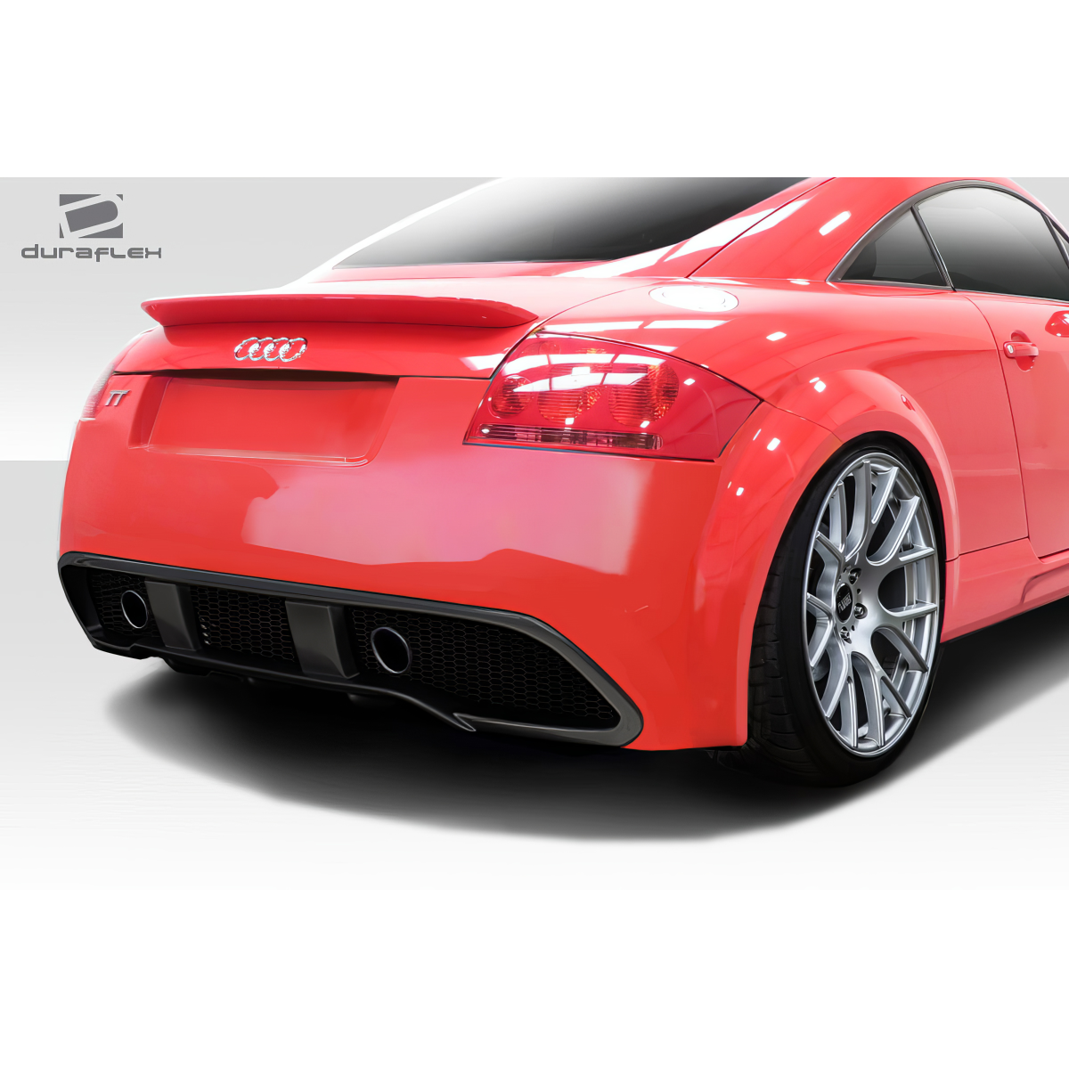Modify your Audi TT 2000 with our Exterior/Rear Bumpers - Rear view angle focusing on bumper design details