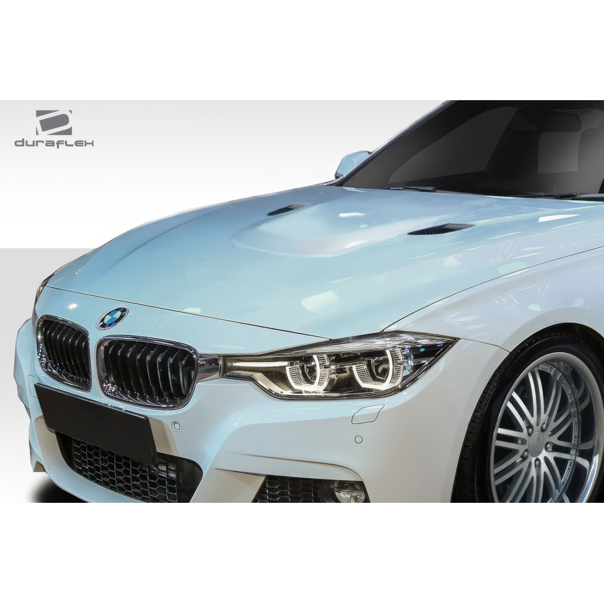 Modify your BMW 3-Series 2012 with our Exterior/Hoods - Front angle view of BMW 3 Series hood