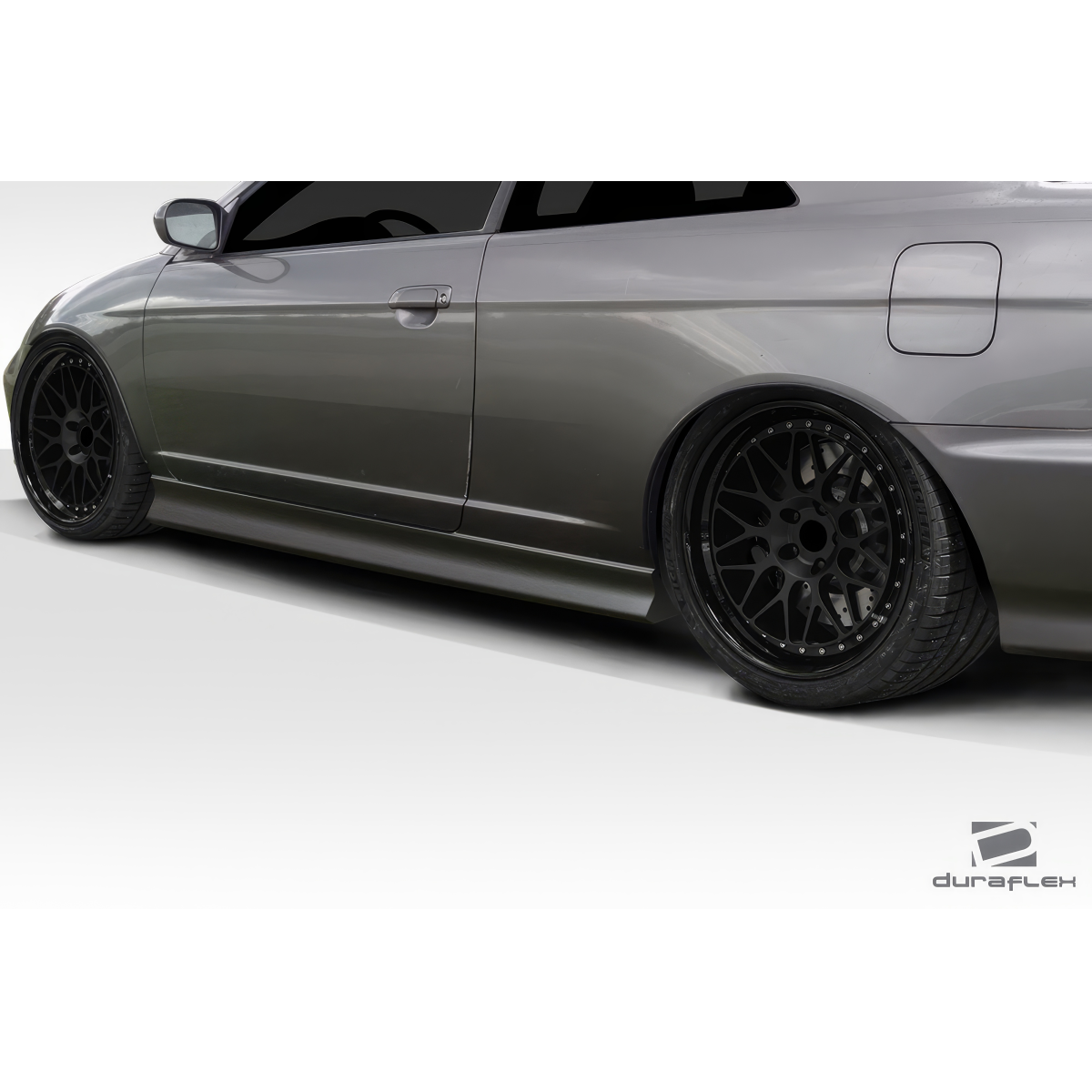 Modify your Honda Civic 2001 with our Exterior/Side Skirts - Side angle view of the vehicle showing skirts